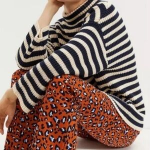 Anthropologie Orange and Black Leopard Print Flare Pants